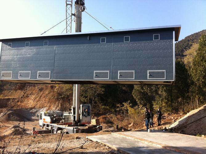 �������b